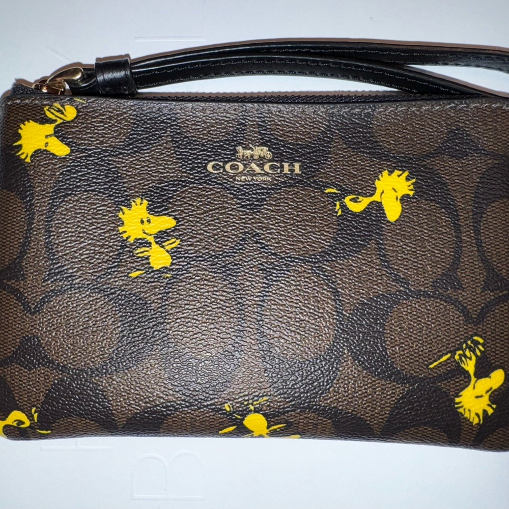 Limited Edition COACH X Peanuts • Woodstock Wristlet • Signature coated canvas